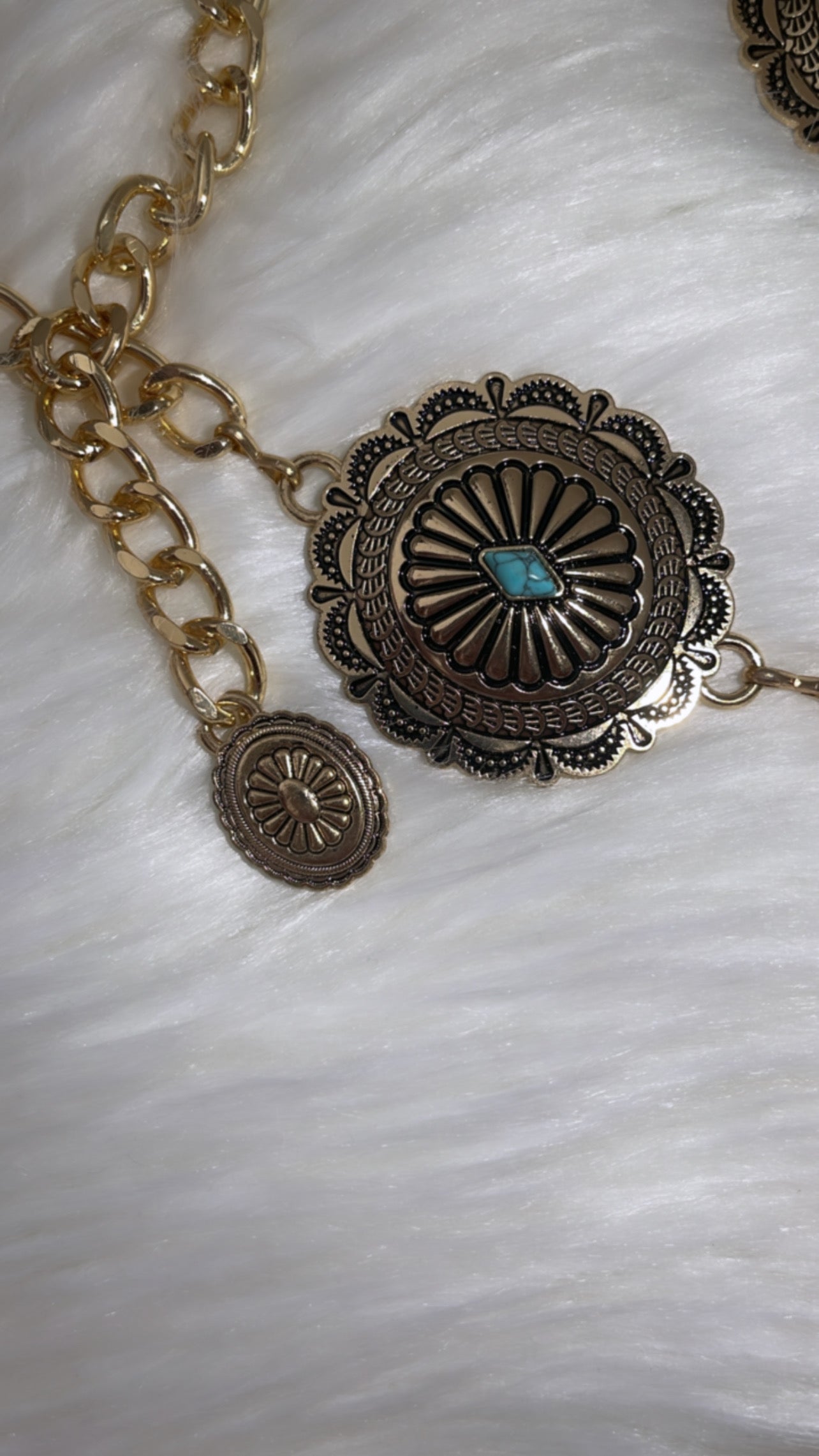 Multiple conchos with turquoise stones