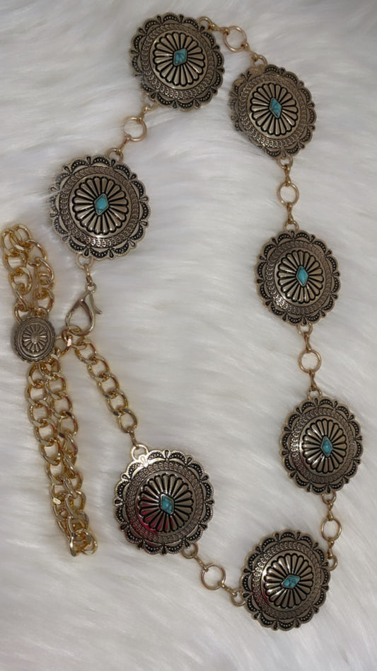 Multiple conchos with turquoise stones